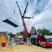 LTM 1650-8.1, 100 Tonnen schwere Fertigteile, Autokrane Schares GmbH, Tandemhub, Dreieck-Traverse, Lastanschlag