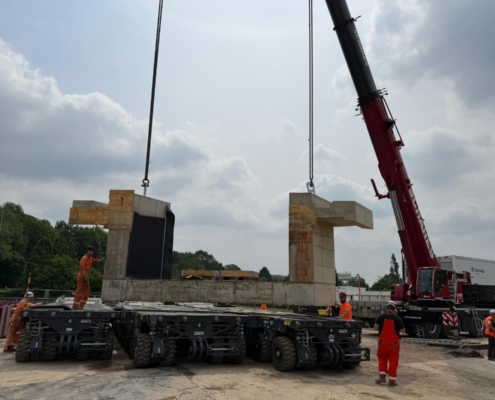 Brückeneinschub, Brückenbau, Krefeld, Autokrane Schares, Schwerlastlogistik, Schwertransport, SPMT, Cometto MSPE, Liebherr LTM 1230-5.1, Liebherr LTM 1650-8.1, Kraneinsatz, Einheben, Einfahren, Rahmenbauwerk, Infrastruktur, Heavy Load, Projektlogistik, Engineering, Brückenmontage, One-Stop-Shop, Mobilkran, Spezialtransport, Großkran, Fertigteilmontage, Verschubtechnik